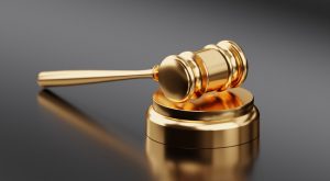 Enterprise Probation Violation Defense Attorney Canva Golden Hammer and Gavel 300x165